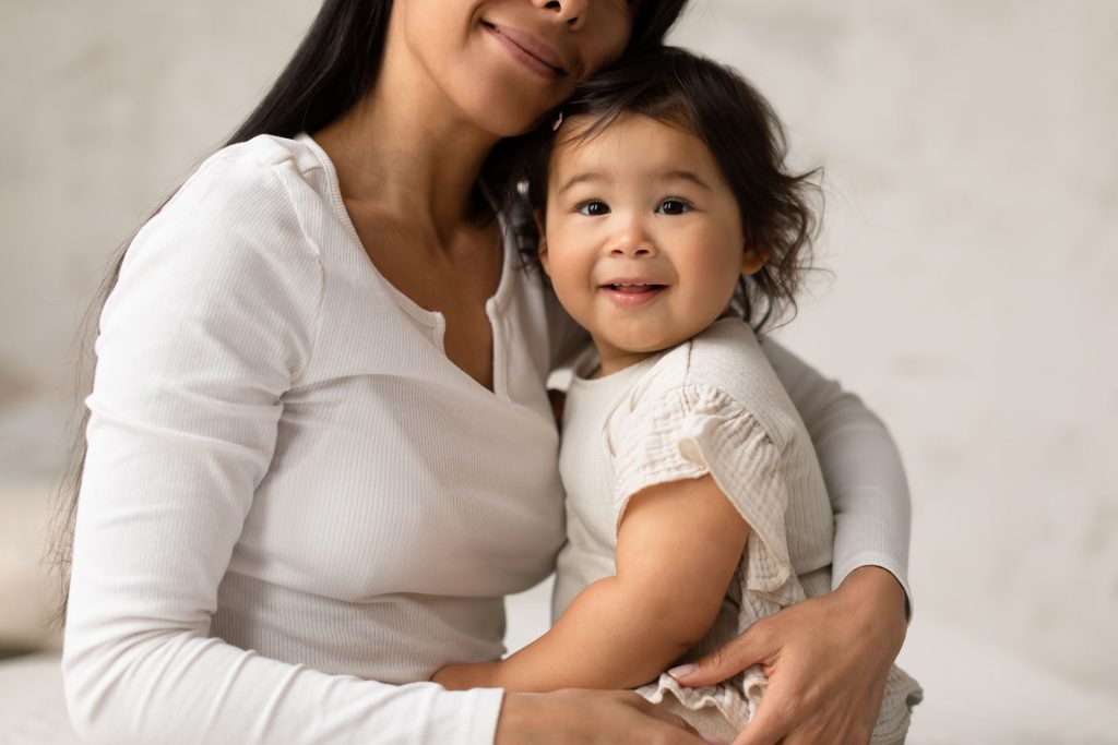 Asian mom and her child.