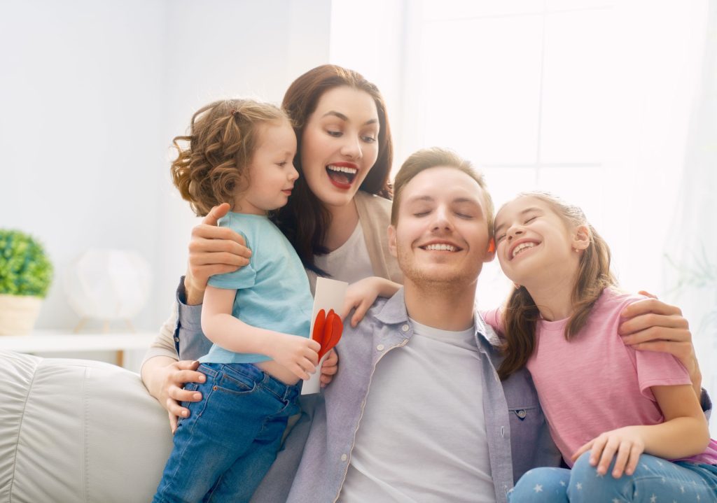 Happy family in their home.