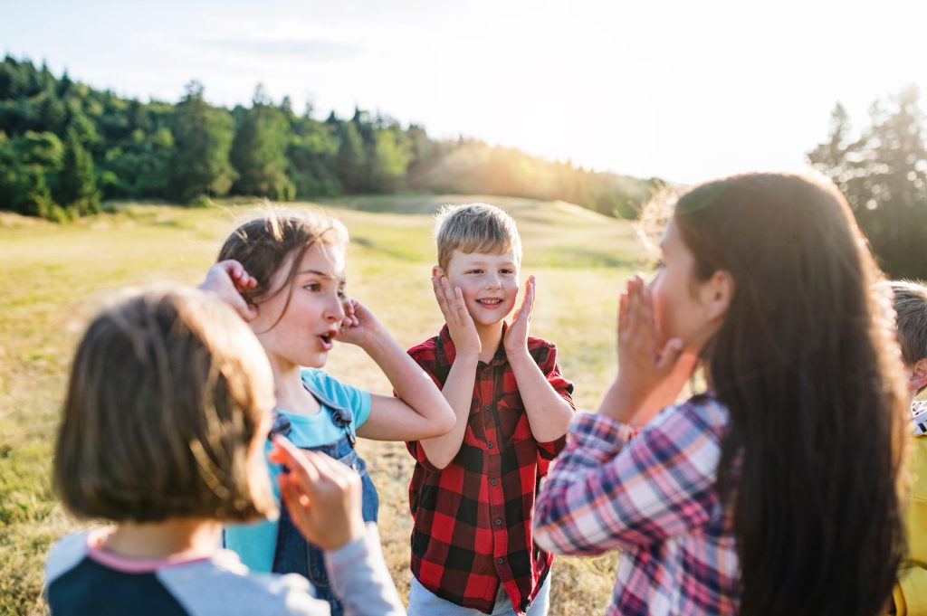 Group of kids socializing and playing.