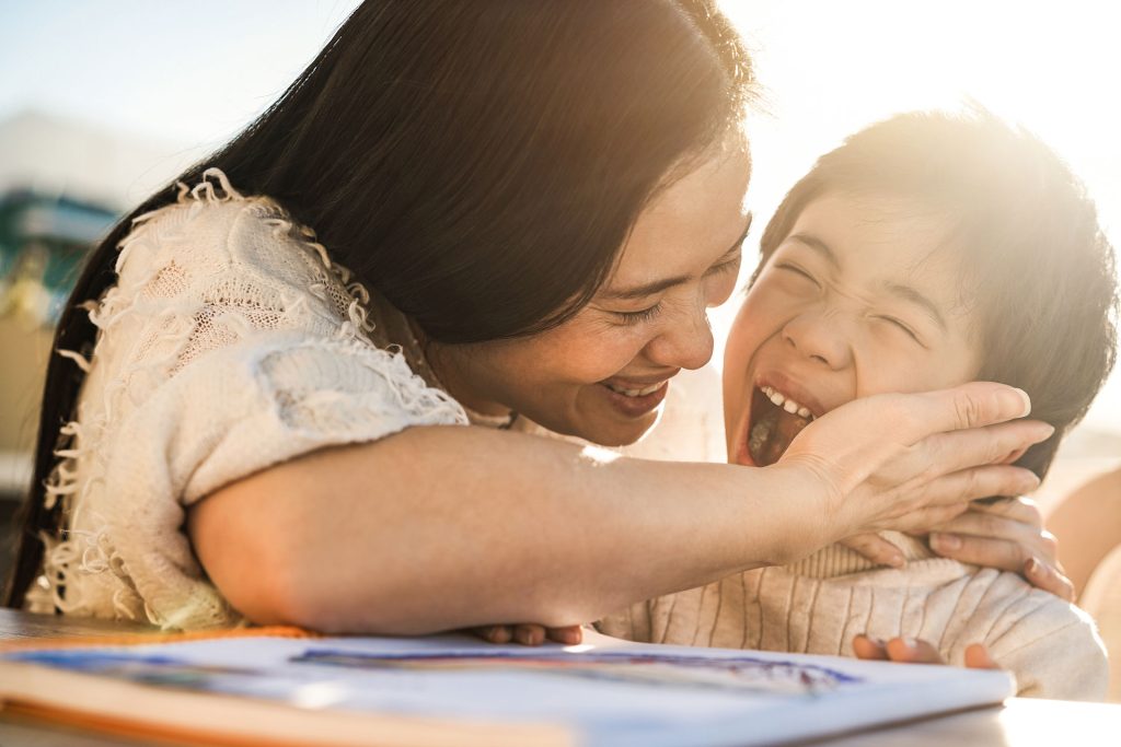 Happy Asian mother and son.