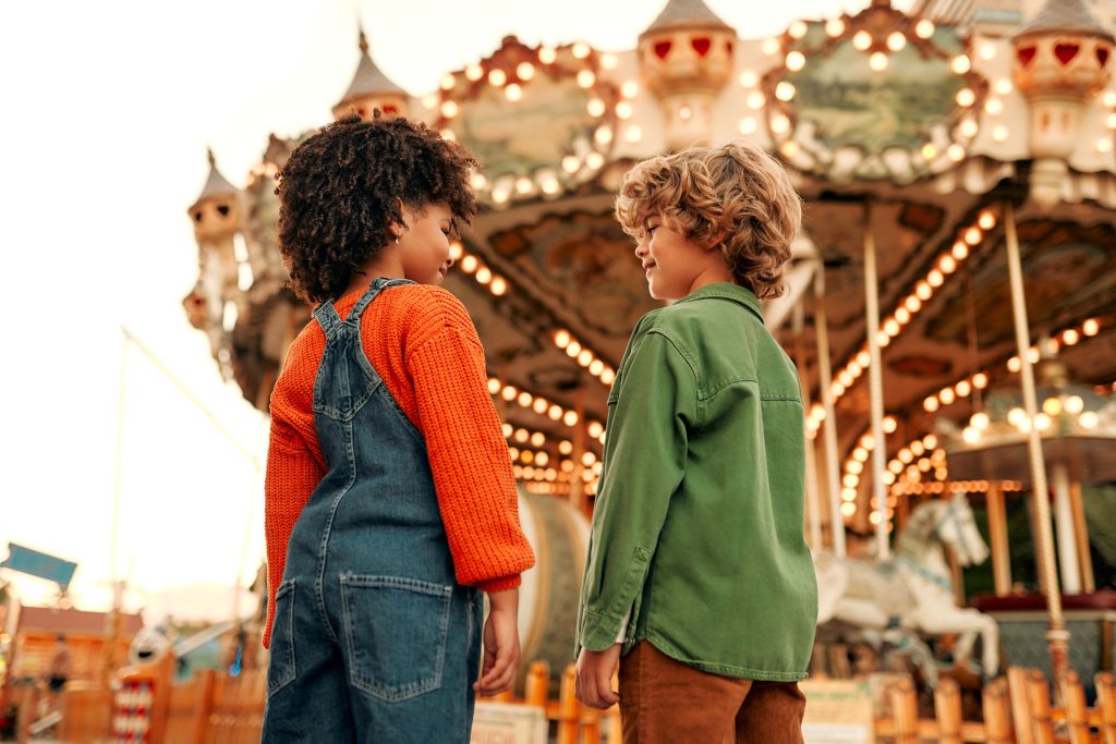 Happy kids on carousel.