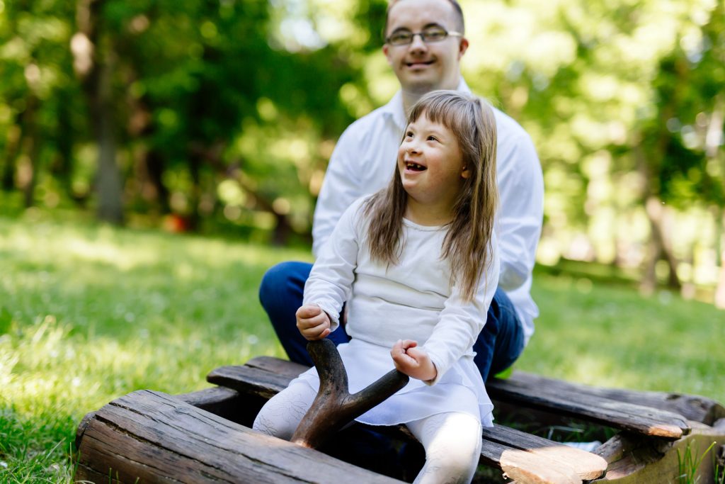 People with down syndrome enjoying outdoor.